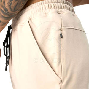 Venta al por mayor de ropa deportiva para hombre, pantalones de chándal informales para uso en invierno, pantalones de chándal informales para hombre a la venta en línea - Product Image 6