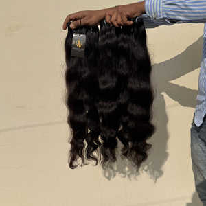 Venta al por mayor de extensiones de cabello ondulado suelto cutícula natural alineada crudo ondulado sin procesar templo indio Paquete de cabello humano - Product Image 1