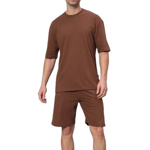 Ensemble de survêtement d'été pour homme : T-shirt à manches courtes et short de sport ample en coton tricoté respirant, couleur unie, 2 pièces - Product Image 1