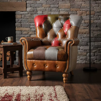 Canapé Chesterfield moderne une place en cuir véritable convertible, assise confortable et rembourrée, élément élégant pour appartement