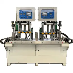 चीन का कारखाना सटीक धातु कास्टिंग उपकरण वर्टिकल डबल स्टेशन 10T सिलेंडर-मुक्त मोम इंजेक्शन मशीन का उत्पादन करता है