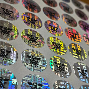 Etiqueta de Seguridad Holográfica Personalizable, Ovalada, Plateada, a Prueba de Manipulación, Impermeable, con Función Holográfica, Solución de Etiquetas Digitech - Product Image 1