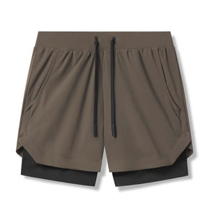 Pantalones cortos 2 en 1 de alto rendimiento para corredores y entusiastas del gimnasio que ofrecen comodidad durante todo el día - Product Image 1