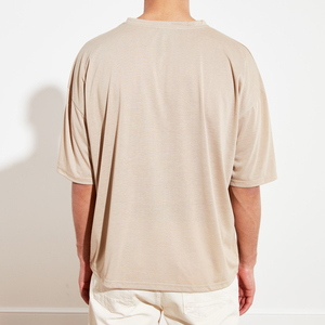 เสื้อยืดพิมพ์โลโก้ตามสั่ง OEM เสื้อยืดคอตตอน 100% พิมพ์โลโก้ตามสั่ง เสื้อยืดโอเวอร์ไซส์สำหรับผู้ชายและผู้หญิง ผู้ผลิตในปากีสถาน - Product Image 4