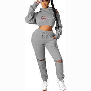 ชุดวอร์มเอวลอยมีฮู้ดสีเทาของผู้หญิง,กางเกงวอร์มทรงสลิมฟิตพร้อมฮู้ดสีเทา - Product Image 1