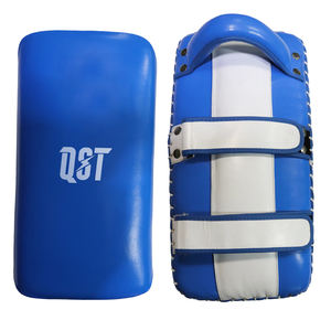 แผ่นรองต่อยมวยไทยคุณภาพพรีเมียม QST International 2 ชิ้น อุปกรณ์ฝึกซ้อมศิลปะการต่อสู้ หนัง PU PVC ระดับอัลติเมท - Product Image 1