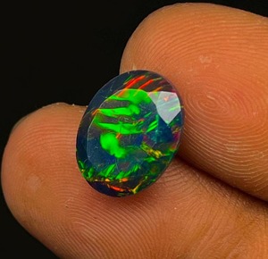 Natural Ethiopian Welo Fire Black <b>Opal</b> Faceted Loose Gemstone in Oval Cut <b>Opal</b> Cut Stone - Product Image 4