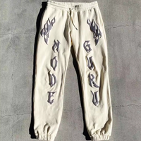 Pantalon de survêtement évasé délavé à l'acide Streetwear avec logo personnalisé et patchs brodés pour hommes pantalons droits à rayures incurvées