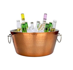 Designer copper ice bucket with dual handles and hammered surface great for serving cold <b>drinks</b> at family or formal gatherings - Product Image 3