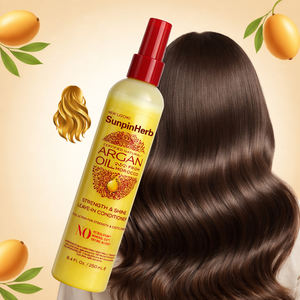 Après-shampoing sans rinçage à l'huile d'argan naturelle Creme of Nature pour cheveux bouclés et crépus, hydratation, réparation et brillance - Product Image 1