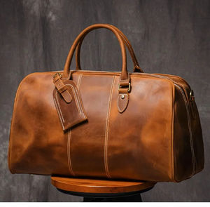 Bolsa de lona de cuero genuino de calidad superior Bolsa de viaje de almacenamiento grande para hombres Bolsa de fin de semana de cuero con logotipo personalizado - Product Image 1