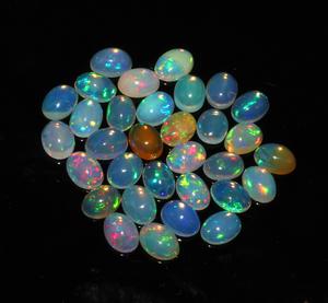 Natural Ethiopian Opal Loose Cabochon Gemstones 5x7mm Oval Cut Shape 32pcs Lot - Product Image 1