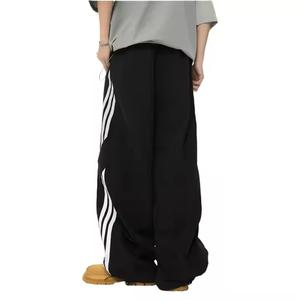 Pantalon de survêtement droit décontracté et sportif pour hommes Pantalon en nylon unisexe à séchage rapide à rayures Taille élastique brodée Service OEM - Product Image 3