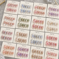 Kuku Palsu Fairycore Press-on Grosir Buatan Tangan 3D Kristal Bunga Jelly Almond Dapat Digunakan Kembali Kuku Palsu Kustom Pemasok OEM