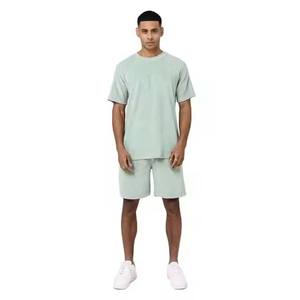 Conjunto de ropa deportiva para hombre de estilo informal al por mayor, pantalones cortos de verano y top de manga corta, tejido transpirable y de secado rápido, 100% algodón - Product Image 1
