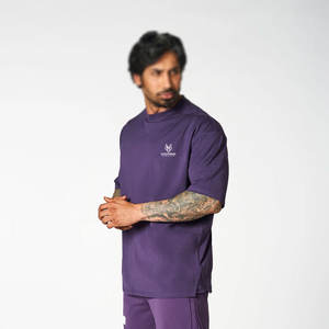 T-shirt à épaules tombantes de couleur unie 100% coton Style de rue imprimé audacieux pour hommes/femmes - Product Image 5