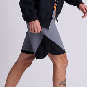 Short de gymnastique pour hommes en gros OEM double couche de polyester avec motif solide et short d'athlétisme d'entraînement personnalisé - Product Image 2