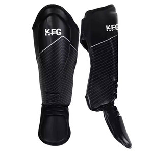Protège-tibias de kickboxing au design optimal avec ajustement réglable pour une utilisation en boxe, arts martiaux et entraînement sportif - Product Image 1