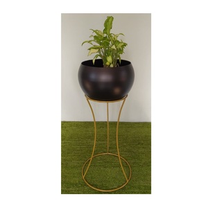 This airy metal wire <b>planter</b> keeps plants stable and adds a simple design that works nicely across many <b>indoor</b> spaces. - Product Image 2