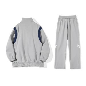 ชุดกันลมสไตล์สตรีทสุดหรูเสื้อแจ็กเก็ตและกางเกงออกกำลังกายน้ำหนักเบาระบายอากาศได้ดีสำหรับผู้ชายและผู้หญิง - Product Image 2