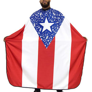 Capa de peluquería con estampado de bandera de poliéster de nailon, escote elástico suave y cómodo, hebilla de acero inoxidable para Peluqueros - Product Image 1