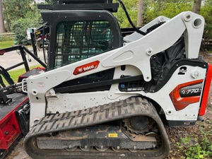 Bobcatts T770 Compact Track Loader equipped with a forestry mulcher is a powerful land-clearing machine designed - Product Image 3