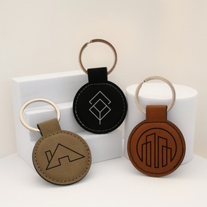 Porte-clés en cuir personnalisé de style vintage durable, porte-clés promotionnel d'entreprise avec forme ovale, initiales gravées - Product Image 1