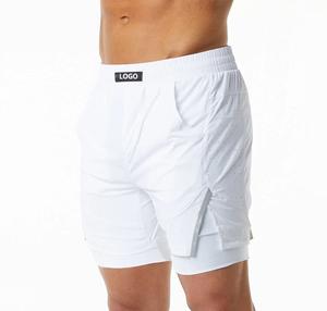Venta al por mayor de pantalones cortos deportivos 2 en 1 para hombre con logotipo personalizado para gimnasio cintura media doble forro estilo deportivo parte inferior de entrenamiento personalizable - Product Image 1