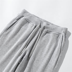 Gran oferta, pantalones cortavientos ligeros para hombre, pantalones informales con bolsillos para correr, patrón recto teñido liso, cintura frontal plana - Product Image 4