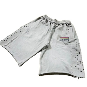 Shorts amples en molleton 100 % coton Gucha Sports pour hommes, avec logo frontal, bords bruts et taille élastique, écologiques, vente en gros - Product Image 1