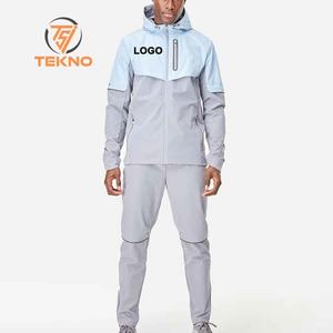 Nouvel arrivage de costume coupe-vent pour hommes en matériau respirant à séchage rapide meilleure vente costume coupe-vent pour hommes de couleur unie avec service OEM - Product Image 1