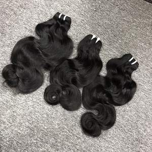 Venta al por mayor 100% Virgen vietnamita trama de pelo crudo de alta calidad onda del cuerpo Color claro gran Stock modelo de cinta - Product Image 1