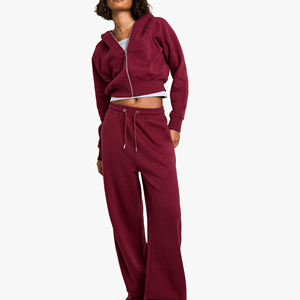 Ensemble deux pièces pour femmes, sweat à capuche court à cordon de serrage en coton 100% personnalisé, pantalon évasé, couleur unie, survêtement de printemps, vente chaude - Product Image 1
