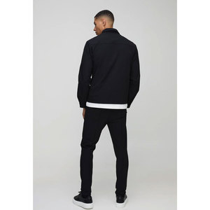 ชุดเดรสธุรกิจสีพื้นแขนยาวผ้าฝ้ายโพลีเอสเตอร์แบบติดกระดุมสำหรับผู้ชายชุดทำงานแบบทางการ - Product Image 2