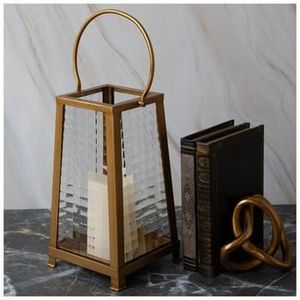 Slim brass <b>candle</b> <b>lantern</b> with geometric patterns suitable for modern bohemian or Indian heritage inspired interiors - Product Image 3