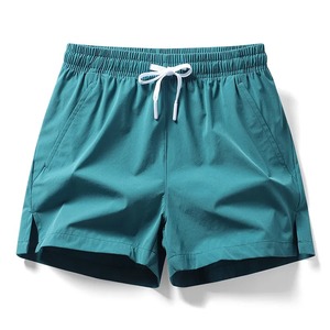 Shorts de plage d'été pour hommes nouveaux modèles couleur unie mode loisirs confortable taille élastique Double poches Cool Shorts de sport - Product Image 2