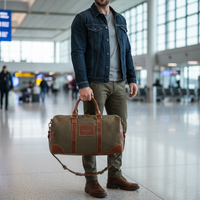 Fournisseur en gros Sac polochon de week-end en toile et cuir avec grand compartiment Sac de voyage en toile en cuir véritable Produit OEM et FBA
