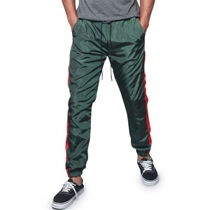 กางเกงกีฬาขาตรงของผู้ชายระบายอากาศได้น้ำหนักเบาแห้งเร็วกางเกงกันลมกางเกงเอวสูงสตรีทแวร์ OEM ตัวเลือก - Product Image 2