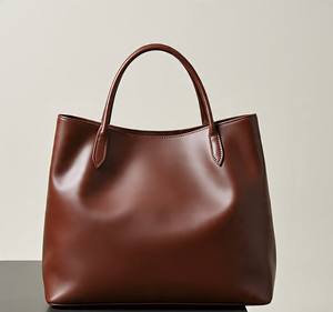 Sac seau élégant et élégant pour dames pour le printemps/été Nouveau sac à main tendance Cuir de couleur unie Dernier style - Product Image 1