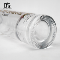 Bouteille de vodka en verre dépoli de première qualité de 750ml personnalisée en gros Conteneur de liqueur vide de qualité supérieure avec bouchon à vis