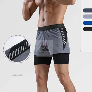 Pantalones cortos atléticos de doble capa unisex, cierre de cintura elástica, patrón sólido ecológico, decoración de encaje de poliéster, servicio OEM - Product Image 5