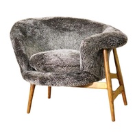 Fauteuil lounge en peau de mouton tufté fait main, design mid-century, durable pour la maison et les clubs