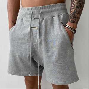 Bermuda de sport pour hommes avec fermeture à cordon de serrage Short de sport simple et ample à la mode pour hommes garçons - Product Image 1