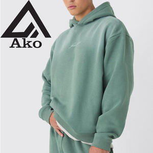 Ensemble sweat à capuche épais en molleton et pantalon de jogging évasé à jambe large, de haute qualité, couleur unie, par Ako - Product Image 1