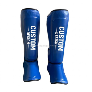 Protège-tibias en cuir personnalisés avec logo OEM pour le karaté, le Muay Thai et le kickboxing – Confortables, durables et protecteurs pour le tibia et le voûte plantaire - Product Image 1