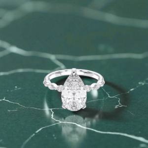 4.24กะรัต E-F/VVS-VS (Centre 4.00CT) ลูกแพร์เพชรโมอิสซาไนต์และแหวนหมั้นเพชรทรงกลมตัดทำด้วยเงินสำหรับเธอ - Product Image 2