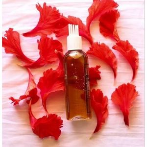 Huile d'hibiscus multi-usages pour les soins et le coiffage des cheveux - Product Image 2