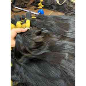 Top 1 vente en gros paquets de cheveux bruts non traités jusqu'à 40 ''100% cheveux humains de femmes vietnamiennes bon matériel - Product Image 1