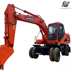 รถขุดล้อยาง Doosan DH150 มือสอง ขนาด 15 ตัน บุ้งกี๋ 0.75 ลบ.ม. แบรนด์เกาหลีแท้ รถขุดก่อสร้างขนาดกลาง ชั่วโมงการใช้งานต่ำ ได้รับการรับรองมาตรฐาน CE - Product Image 1