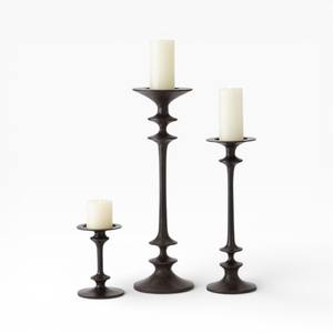 Ensemble moderne de trois bougeoirs en métal noir foncé avec un design classique tourné pour une décoration élégante - Product Image 1